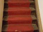 Traplopers leggen 4 trappen 49 tredes, en een 8m lange loper in de gang