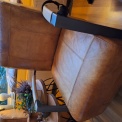 2 leren fauteuils herstoffering. zie foto's